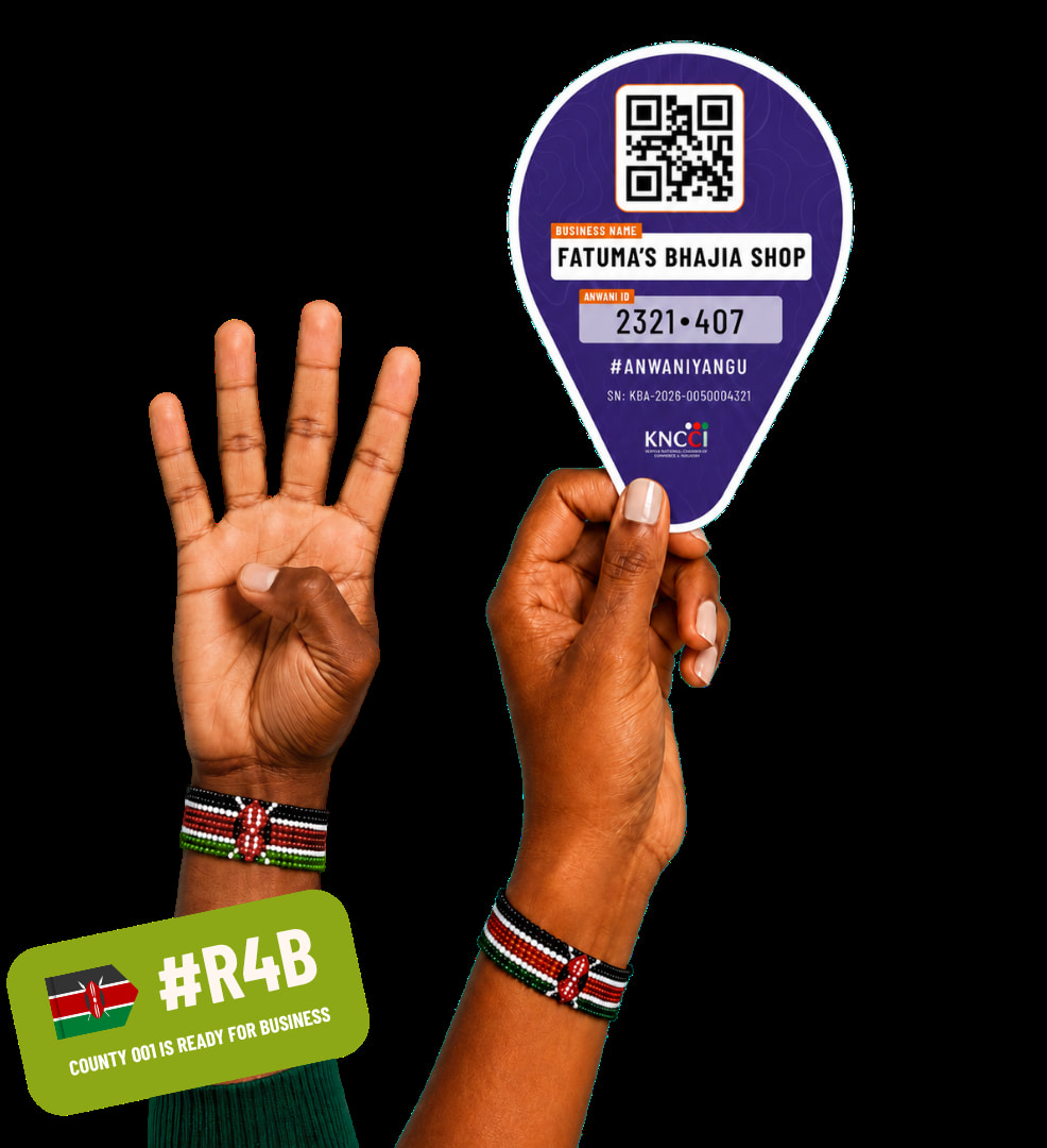 Hands raised holding an Anwani verified business pin — County 001 is Ready for Business